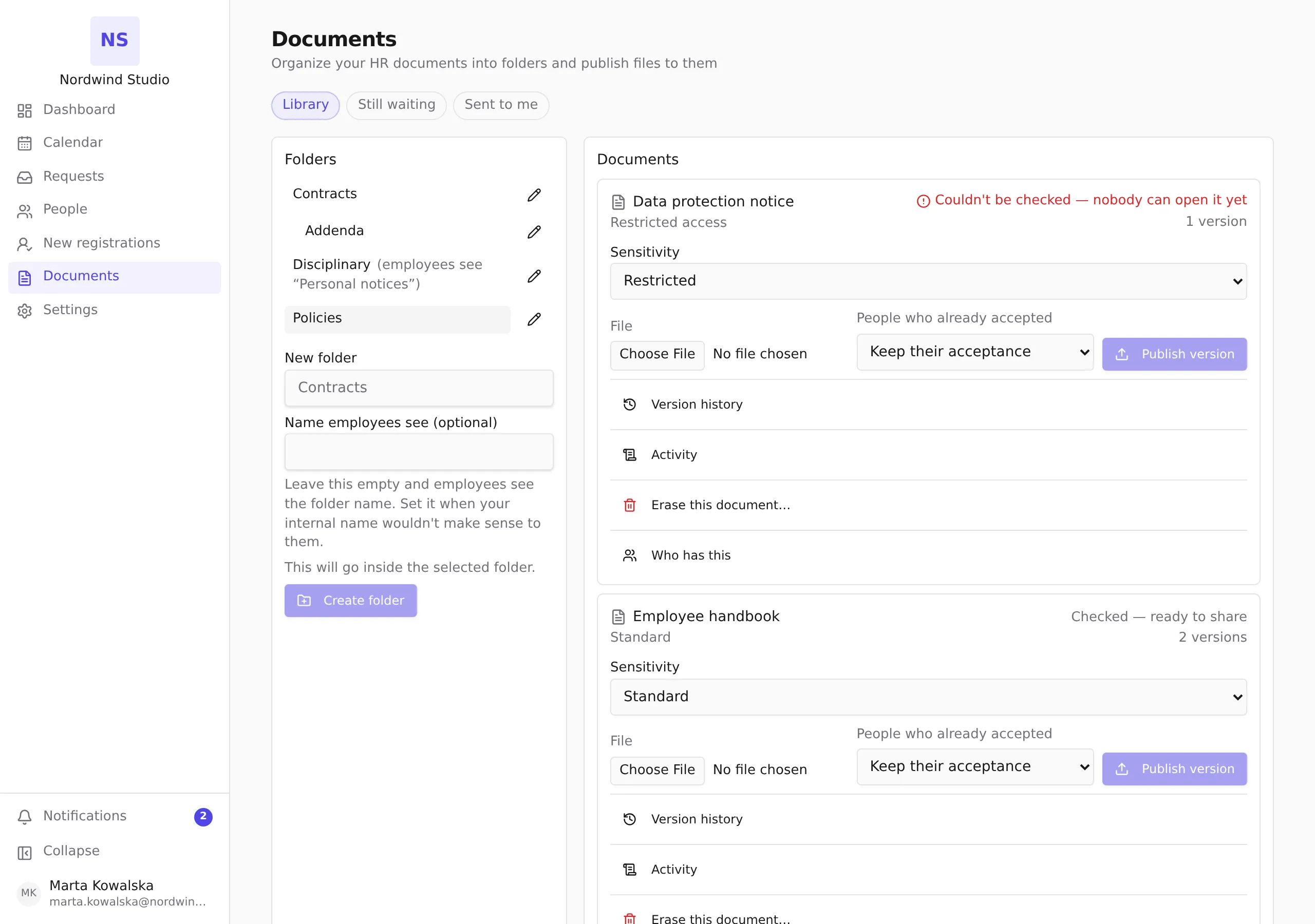 The Documents screen: the folder tree on the left, and a folder's documents with their checking status on the right